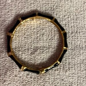 Black bamboo enamel (synthetic) bracelet. Hinged.